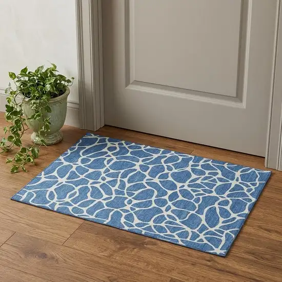 Blue And Ivory Geometric Washable Area Rug With UV Protection Photo 1