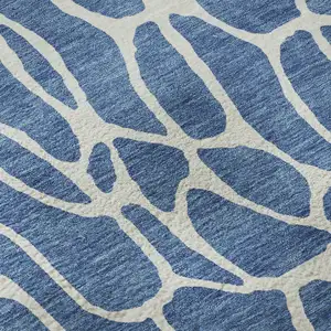 Photo of Blue And Ivory Geometric Washable Area Rug With UV Protection