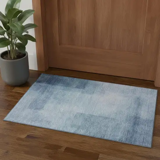 Blue And Ivory Geometric Washable Area Rug With UV Protection Photo 1
