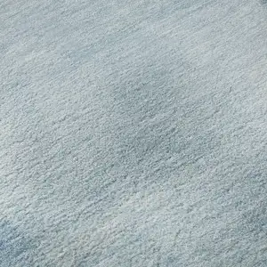 Photo of Blue And Ivory Geometric Washable Area Rug With UV Protection