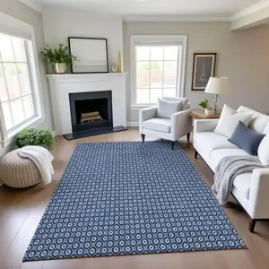 Photo of Blue And Ivory Geometric Washable Area Rug With UV Protection