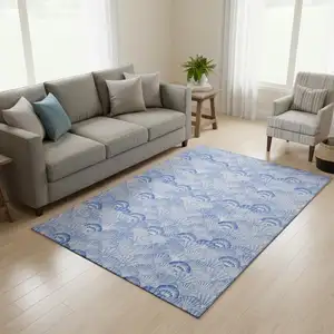 Photo of Blue And Ivory Geometric Washable Area Rug With UV Protection