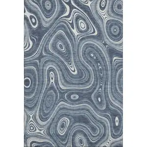 Photo of Blue And Ivory Geometric Washable Area Rug With UV Protection