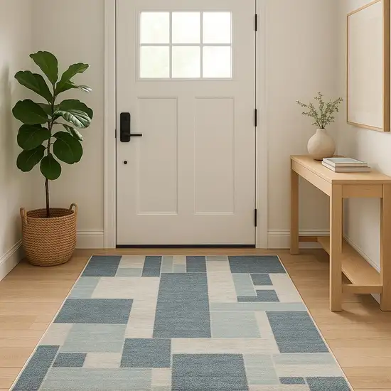 Blue And Ivory Geometric Washable Area Rug Photo 1