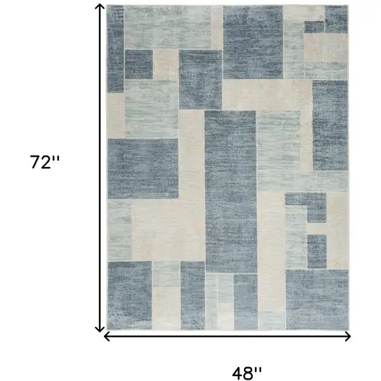 Blue And Ivory Geometric Washable Area Rug Photo 3