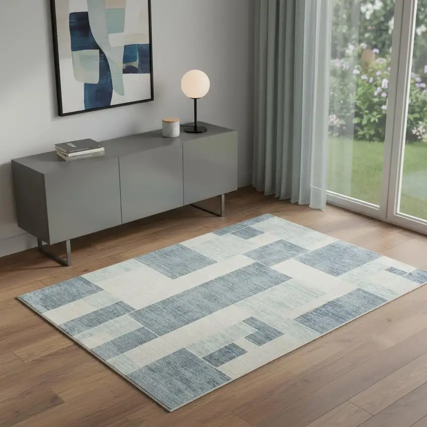 Blue And Ivory Geometric Washable Area Rug Photo 1