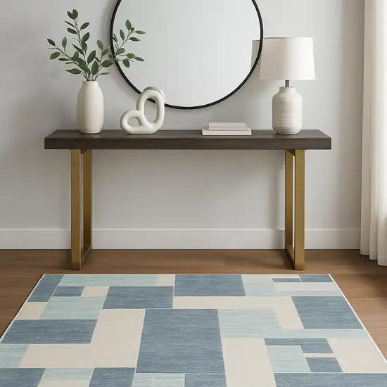 Blue And Ivory Geometric Washable Area Rug Photo 1