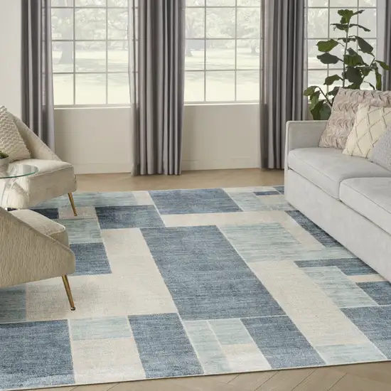 Blue And Ivory Geometric Washable Area Rug Photo 5