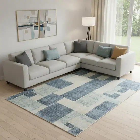 Blue And Ivory Geometric Washable Area Rug Photo 1
