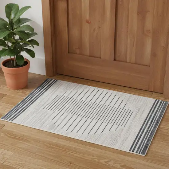 Blue And Ivory Geometric Washable Area Rug Photo 1