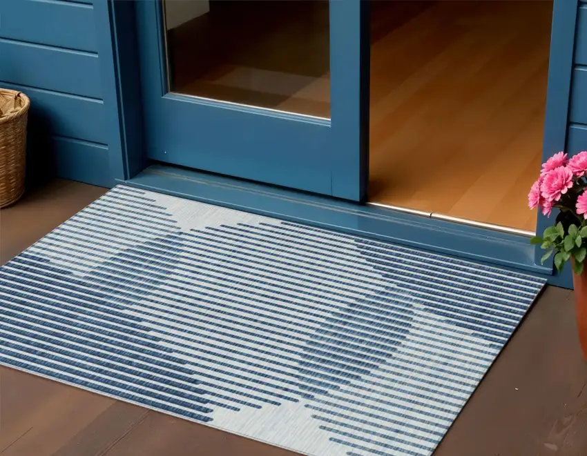 Blue And Ivory Geometric Washable Indoor Outdoor Area Rug Photo 1