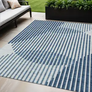 Photo of Blue And Ivory Geometric Washable Indoor Outdoor Area Rug