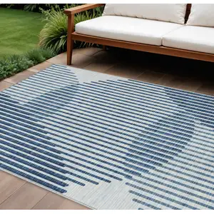 Photo of Blue And Ivory Geometric Washable Indoor Outdoor Area Rug