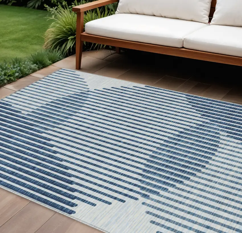 Blue And Ivory Geometric Washable Indoor Outdoor Area Rug Photo 1