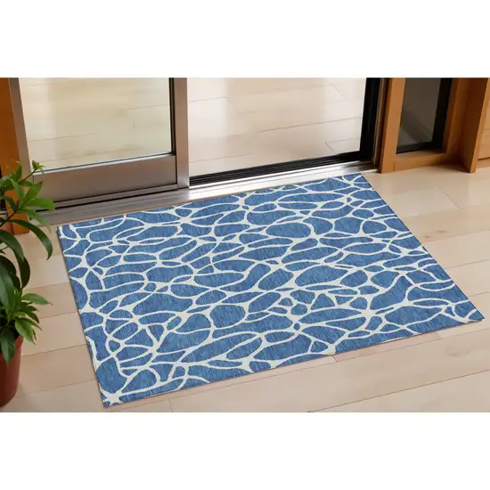 Blue And Ivory Geometric Washable Indoor Outdoor Area Rug Photo 1