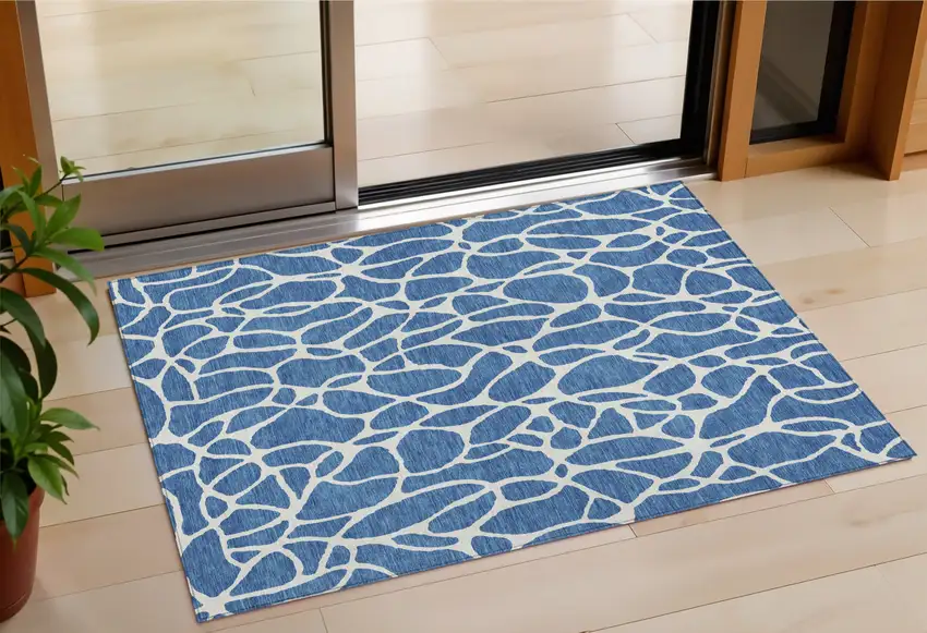 Blue And Ivory Geometric Washable Indoor Outdoor Area Rug Photo 1