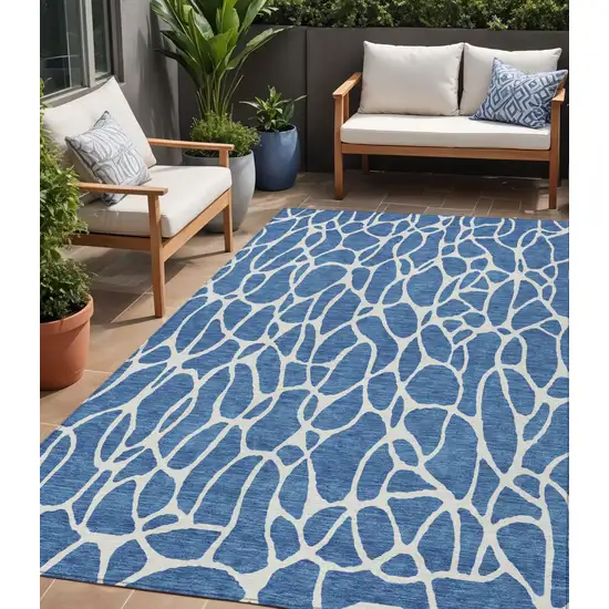 Blue And Ivory Geometric Washable Indoor Outdoor Area Rug Photo 1