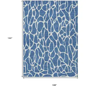 Photo of Blue And Ivory Geometric Washable Indoor Outdoor Area Rug