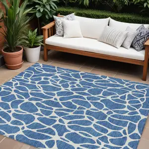 Photo of Blue And Ivory Geometric Washable Indoor Outdoor Area Rug