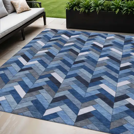 Blue And Ivory Geometric Washable Indoor Outdoor Area Rug Photo 1