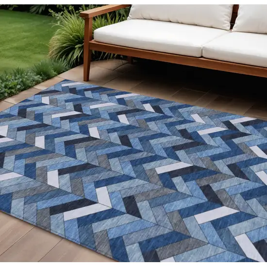 Blue And Ivory Geometric Washable Indoor Outdoor Area Rug Photo 1