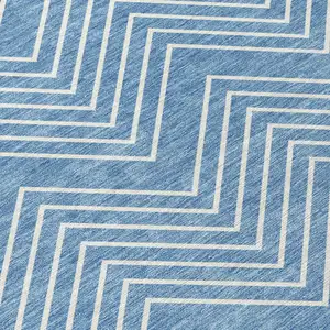 Photo of Blue And Ivory Geometric Washable Indoor Outdoor Area Rug