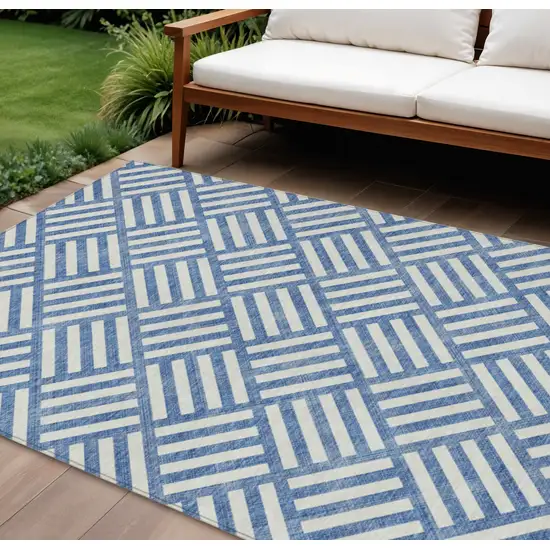 Blue And Ivory Geometric Washable Indoor Outdoor Area Rug Photo 1