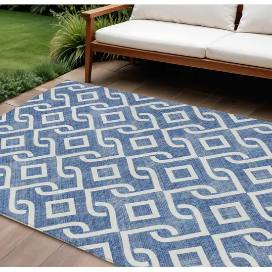 Blue And Ivory Geometric Washable Indoor Outdoor Area Rug Photo 1