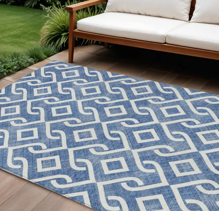 Blue And Ivory Geometric Washable Indoor Outdoor Area Rug Photo 1