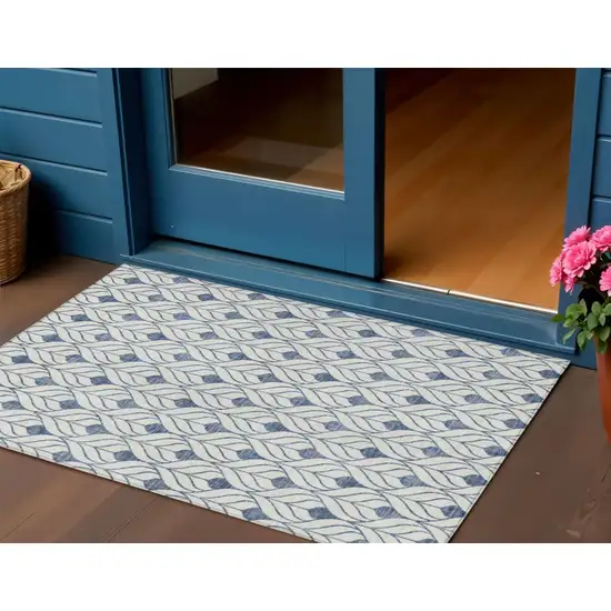 Blue And Ivory Geometric Washable Indoor Outdoor Area Rug Photo 1