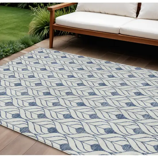 Blue And Ivory Geometric Washable Indoor Outdoor Area Rug Photo 1