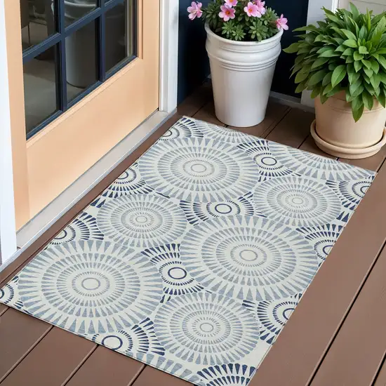 Blue And Ivory Geometric Washable Indoor Outdoor Area Rug Photo 1