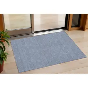 Photo of Blue And Ivory Geometric Washable Indoor Outdoor Area Rug