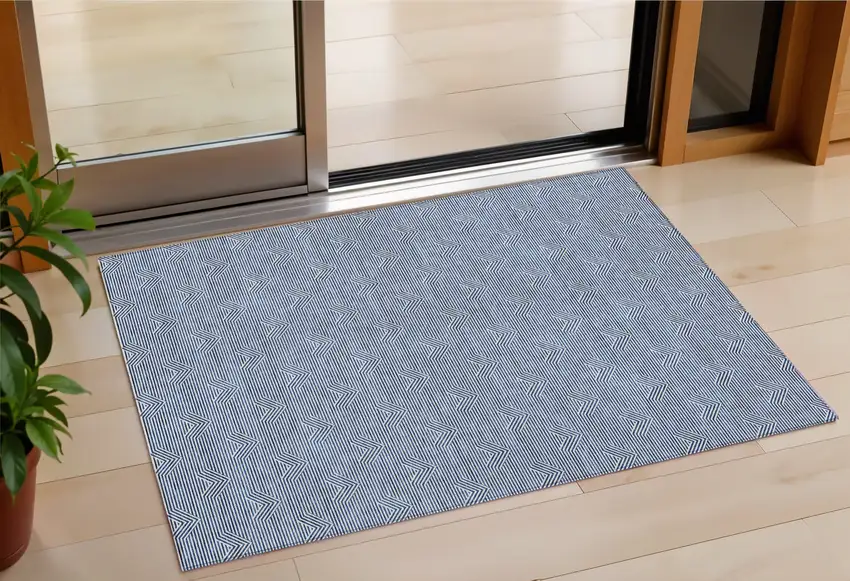 Blue And Ivory Geometric Washable Indoor Outdoor Area Rug Photo 1