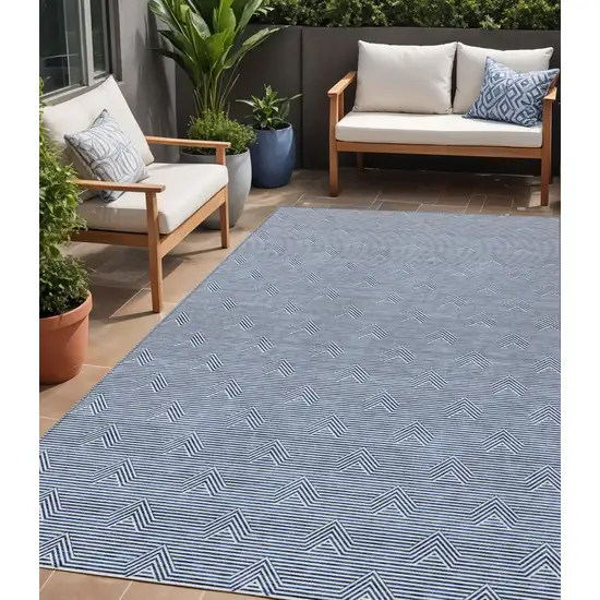 Blue And Ivory Geometric Washable Indoor Outdoor Area Rug Photo 1