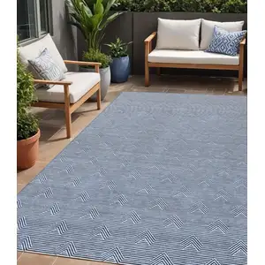 Photo of Blue And Ivory Geometric Washable Indoor Outdoor Area Rug