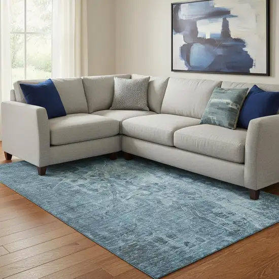 Blue And Ivory Ikat Washable Area Rug With UV Protection Photo 1