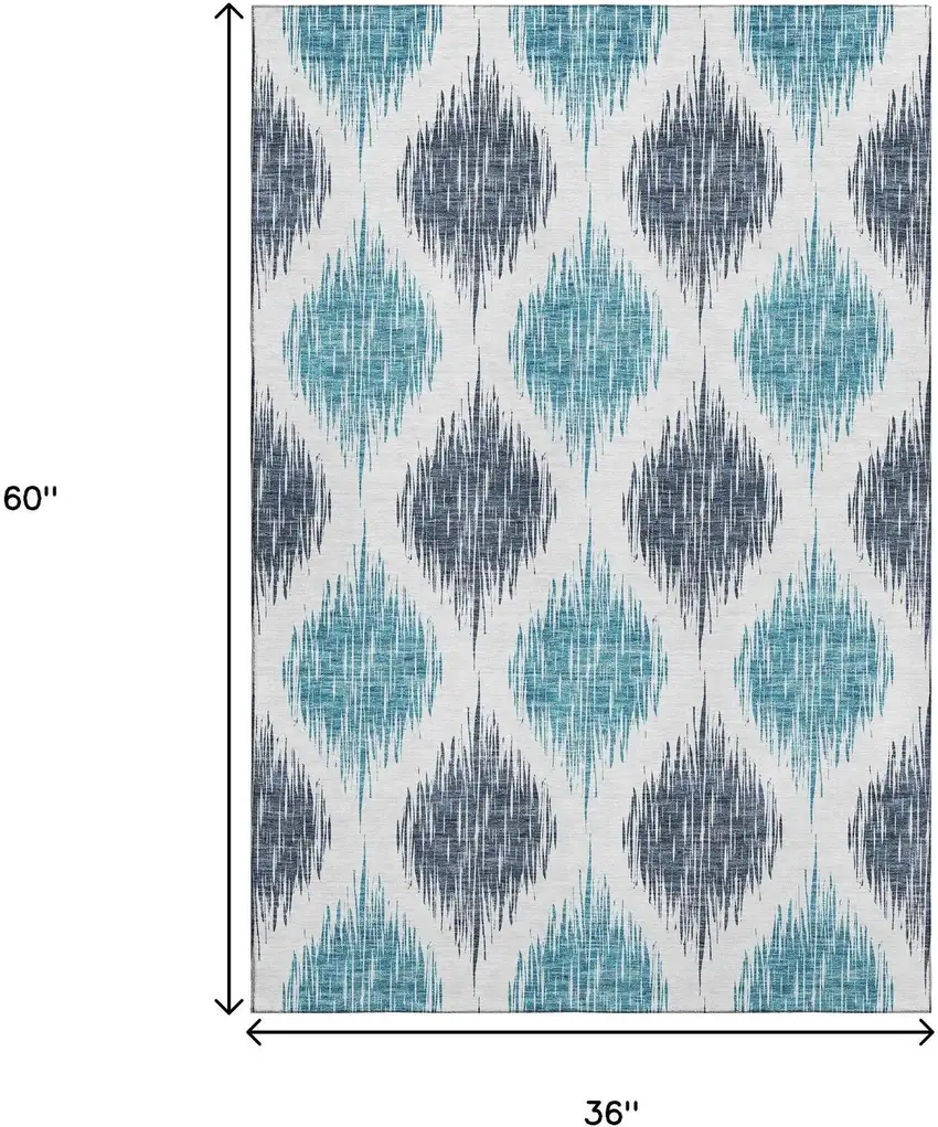 Blue And Ivory Ikat Washable Area Rug With UV Protection Photo 3