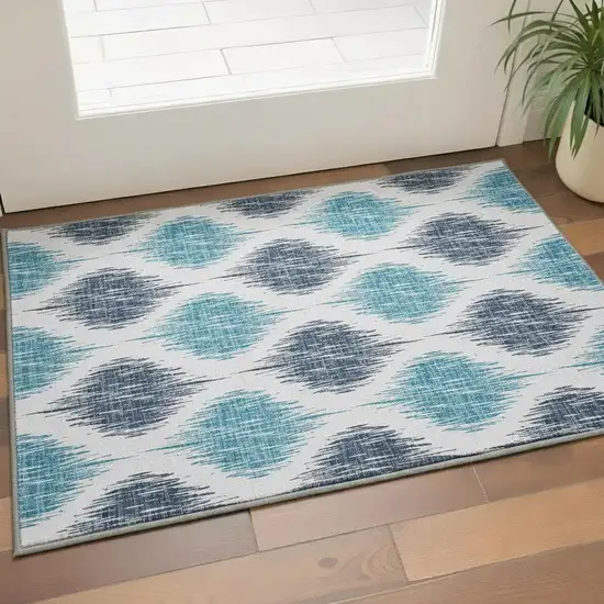 Blue And Ivory Ikat Washable Area Rug With UV Protection Photo 2
