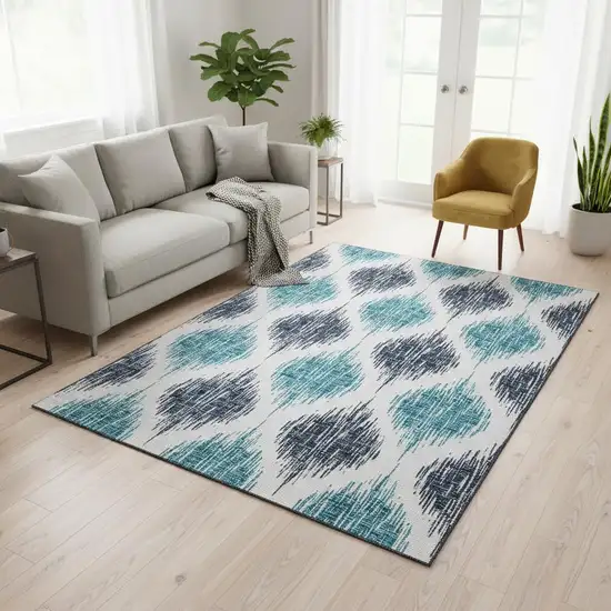 Blue And Ivory Ikat Washable Area Rug With UV Protection Photo 2
