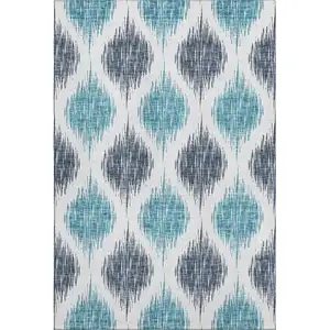 Photo of Blue And Ivory Ikat Washable Area Rug With UV Protection