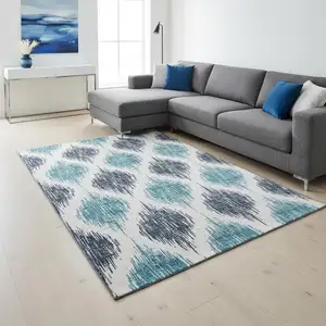 Photo of Blue And Ivory Ikat Washable Area Rug With UV Protection