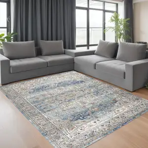 Photo of Blue And Ivory Medallion Distressed Area Rug