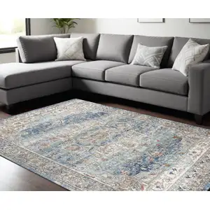 Photo of Blue And Ivory Medallion Distressed Area Rug