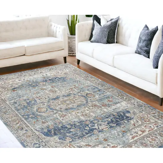 Blue And Ivory Medallion Distressed Area Rug Photo 1