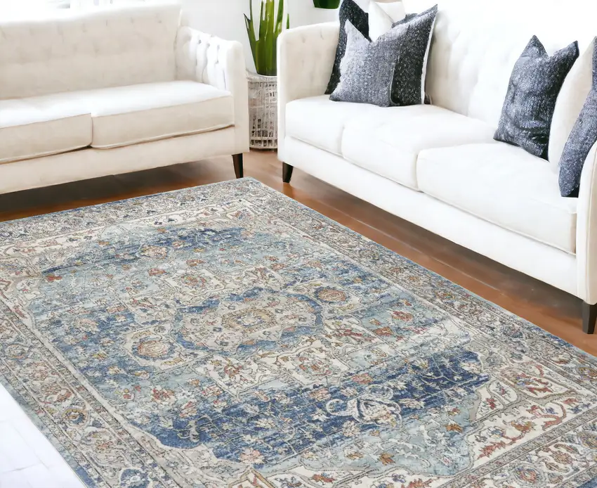 Blue And Ivory Medallion Distressed Area Rug Photo 1