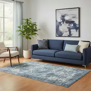 Photo of Blue And Ivory Medallion Distressed Washable Area Rug