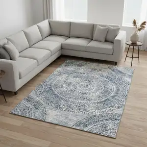 Photo of Blue And Ivory Medallion Washable Area Rug With UV Protection