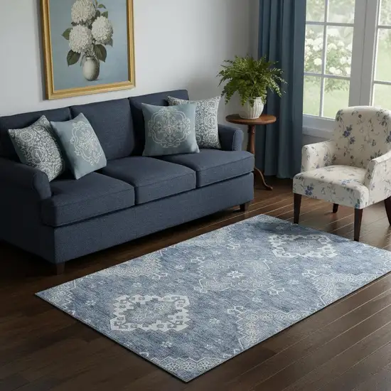 Blue And Ivory Medallion Washable Area Rug With UV Protection Photo 1