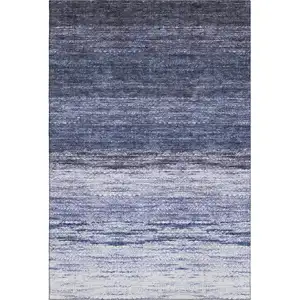Photo of Blue And Ivory Ombre Washable Area Rug With UV Protection